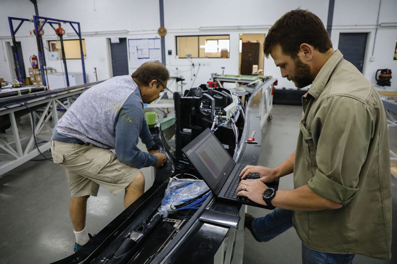 Jonkers Attie Jonker and AP Kotze verifying the position of parts from the CAD models